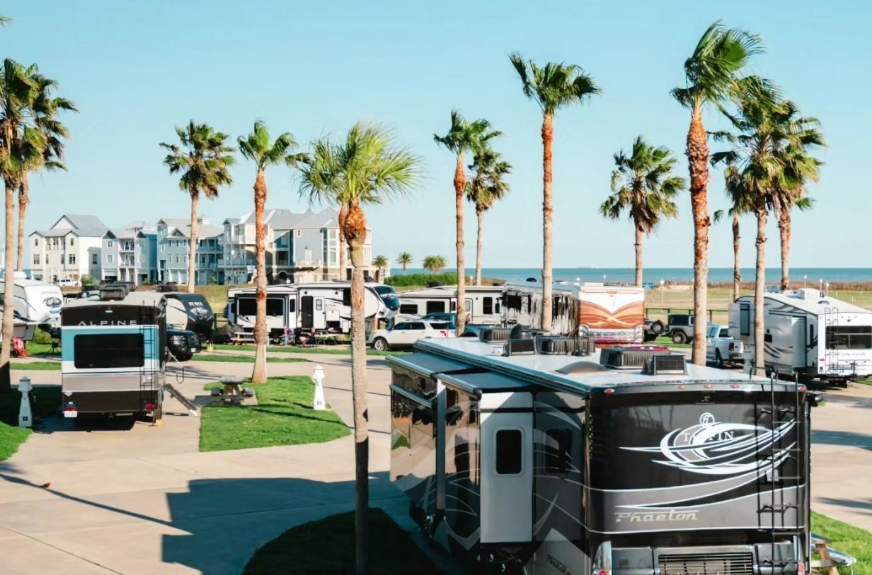 A fifth wheel parked on a pull-through site