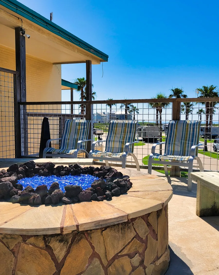 The stone fire pit and outdoor gathering area